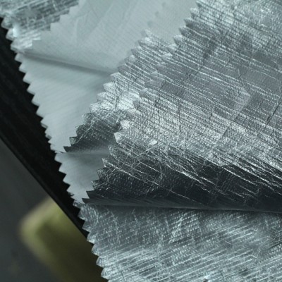 SZ-XR  特衛強  杜邦紙  超薄纸纹纸感防晒衣夹克布料  克重： 55（g/㎡）幅寬：145cm  成份：聚丙烯   細節-3